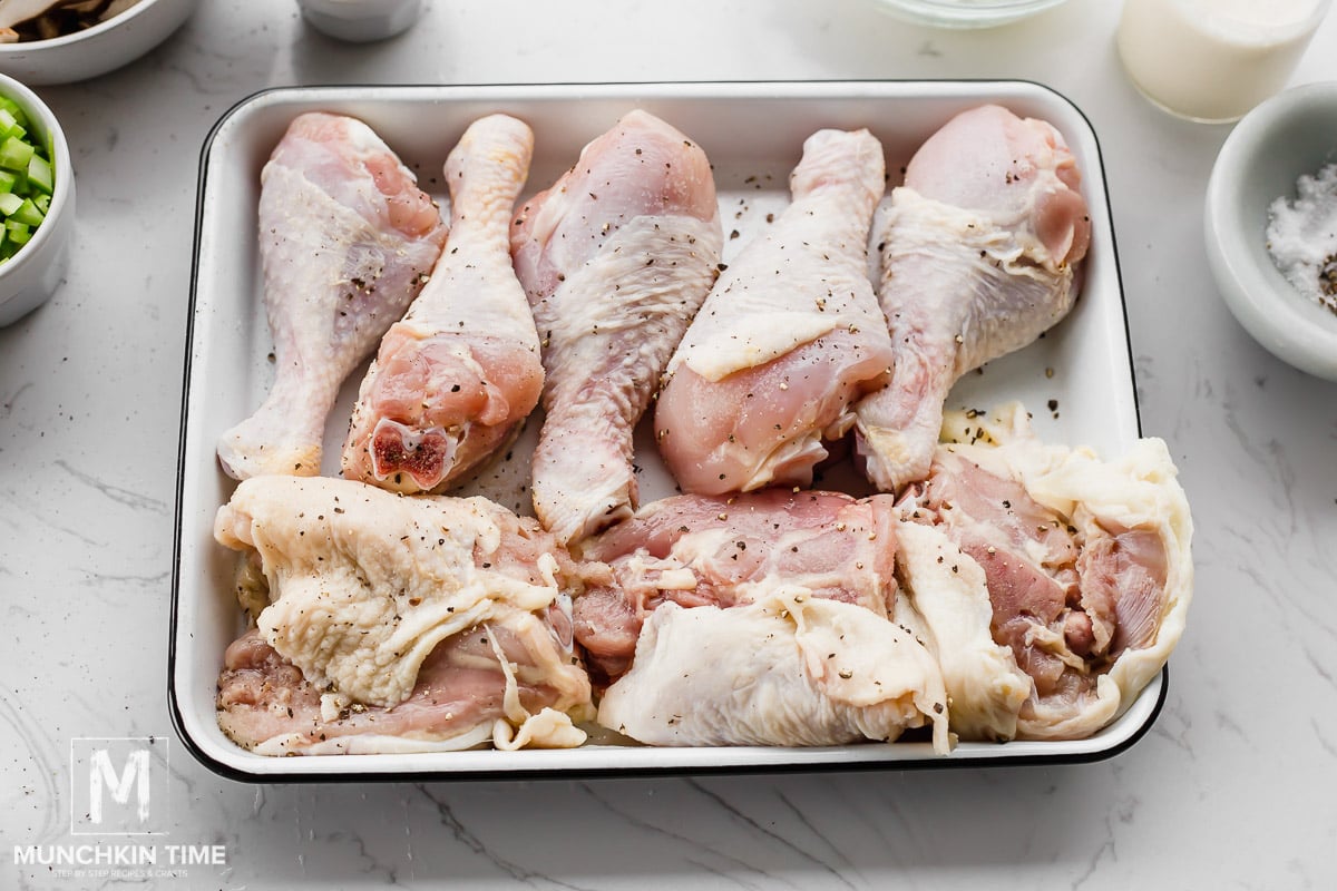 chicken pieces seasoned with salt and pepper.