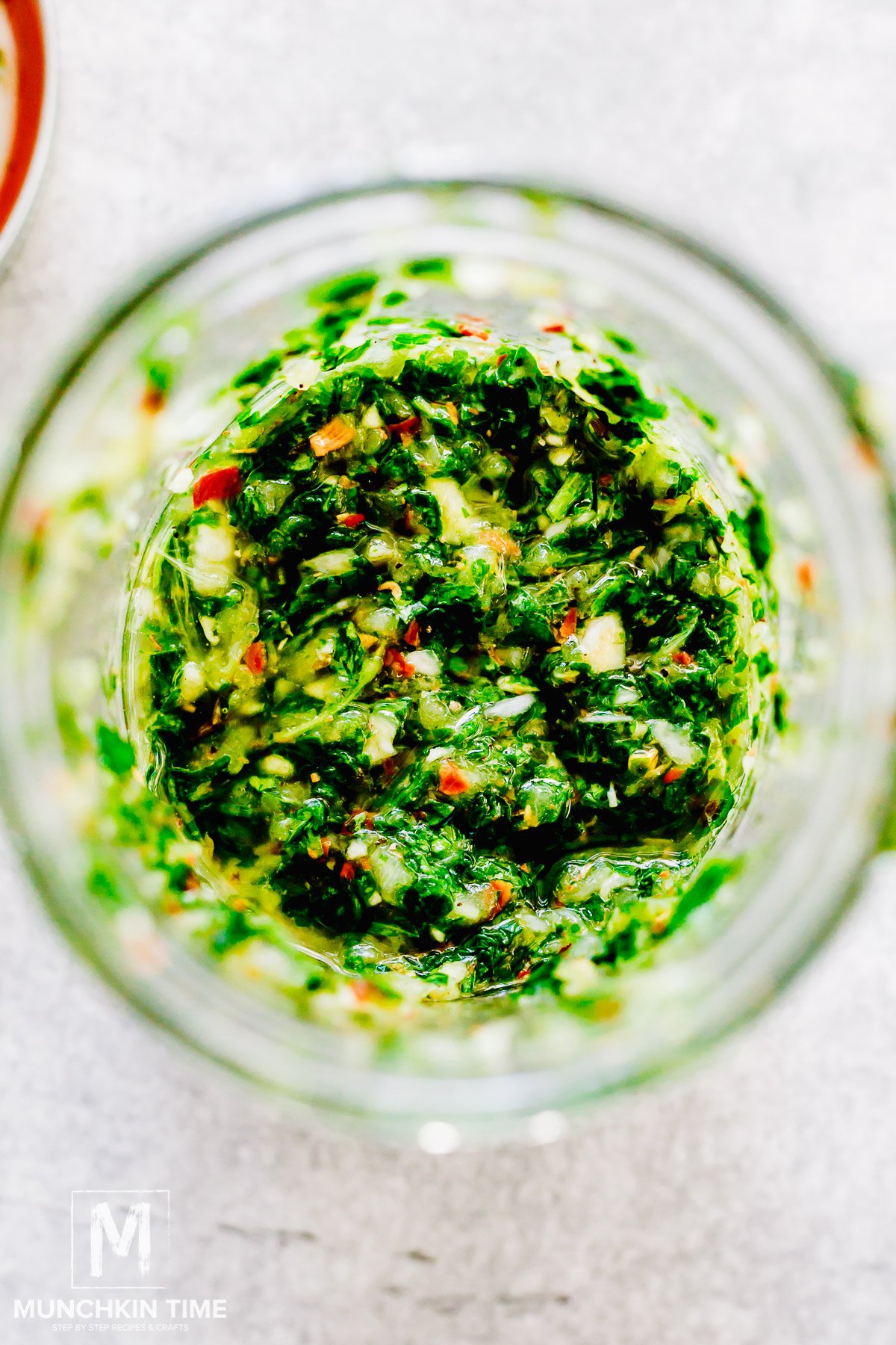 Chimichurri Sauce inside mason jar.