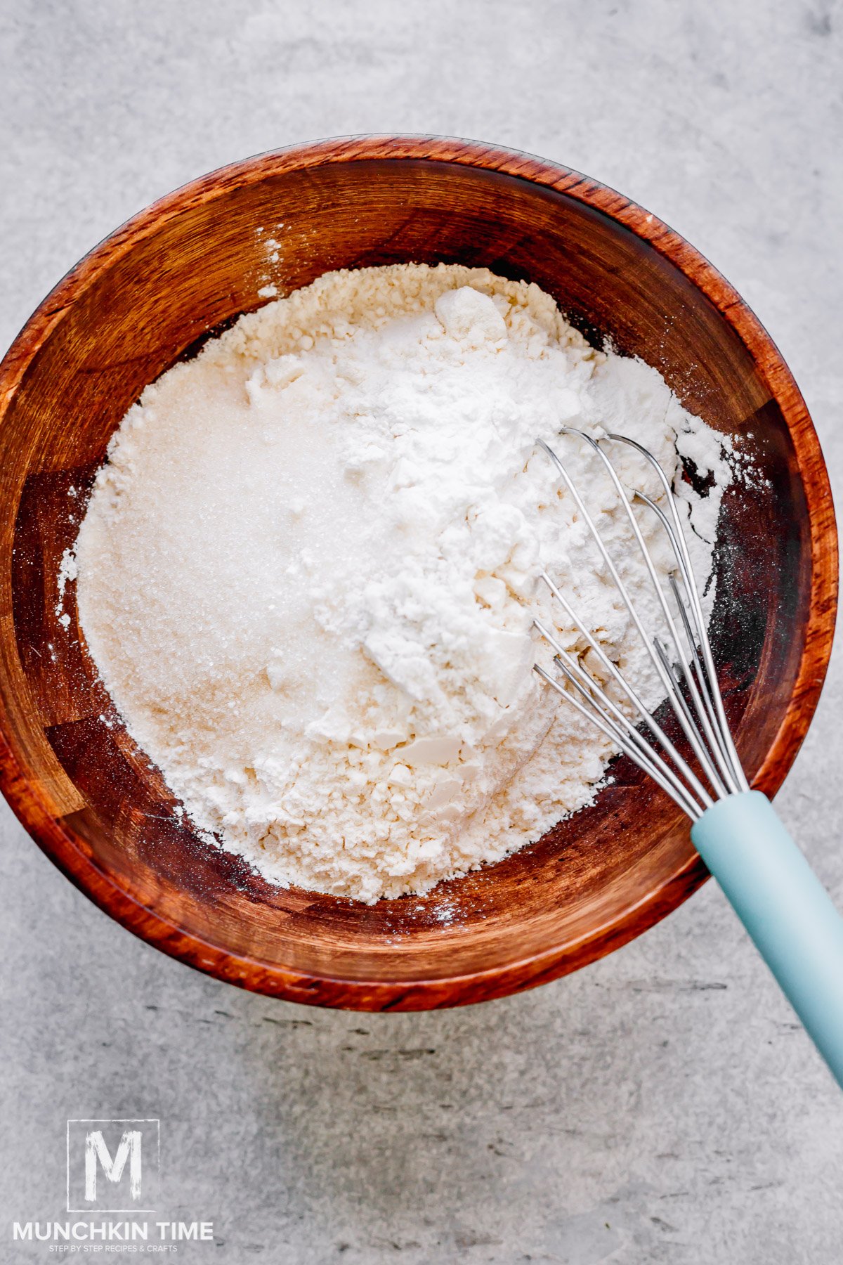 dry ingredients in a bowl with a wisk.