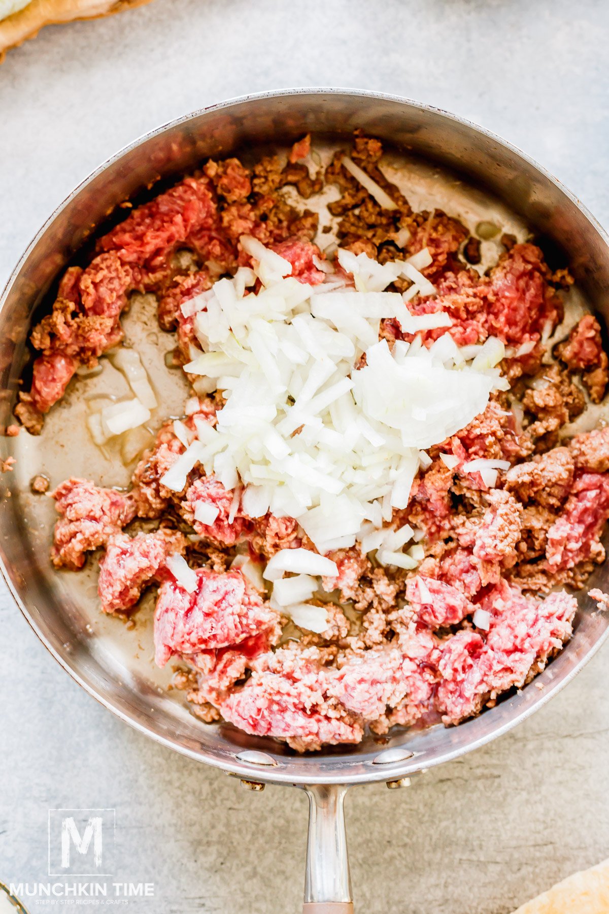 onion and ground beef in the skillet.