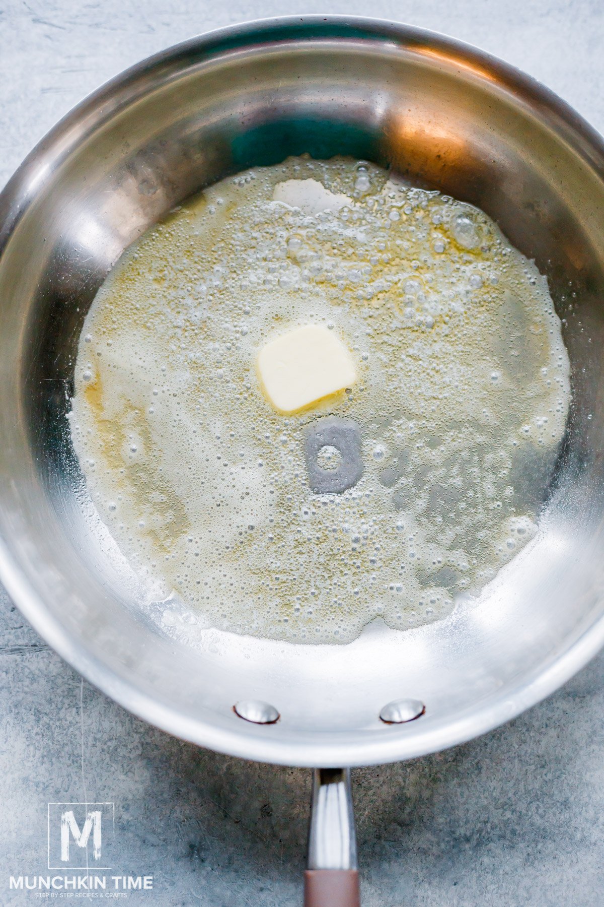 butter melting in the skillet.