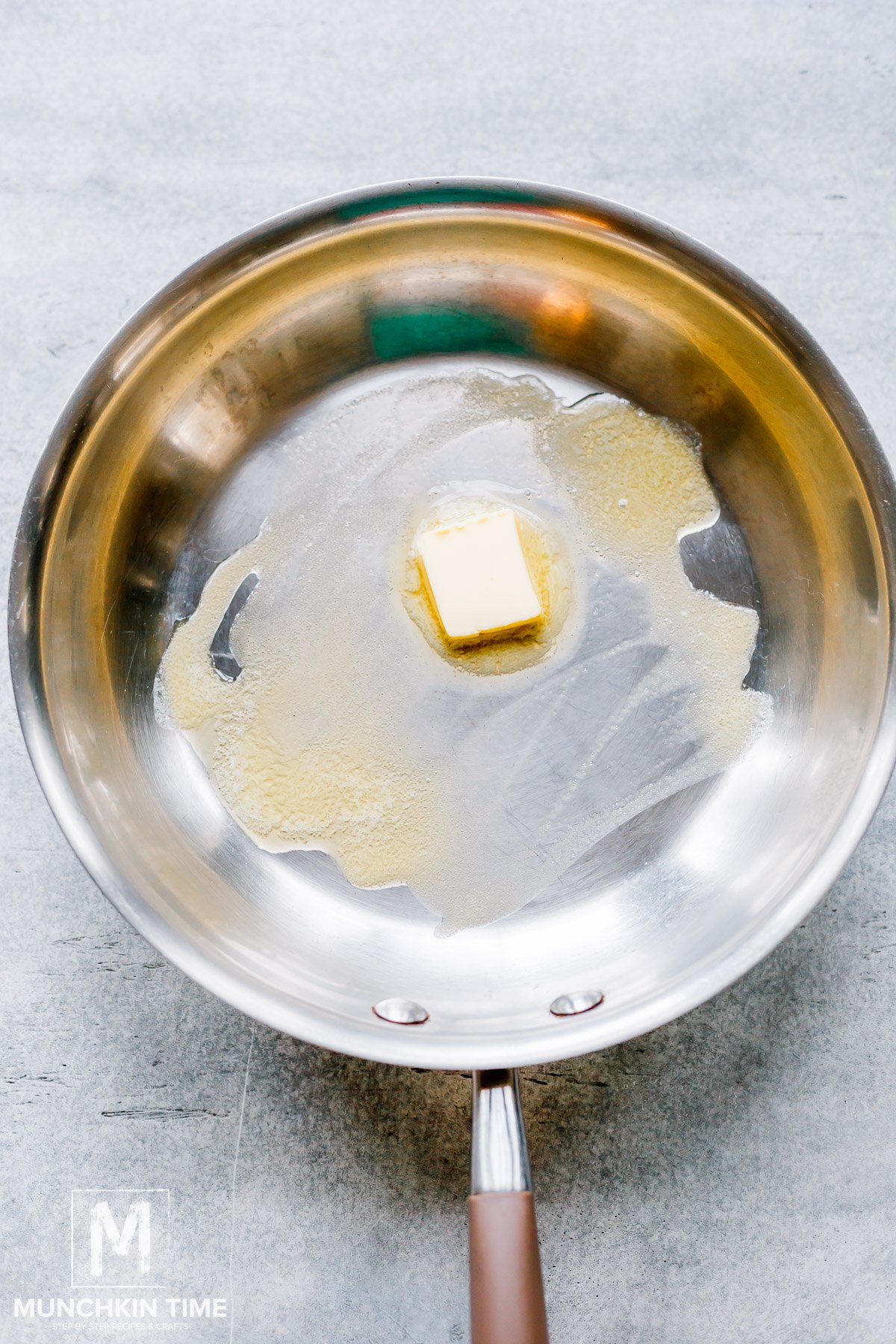 butter milting in the skillet.