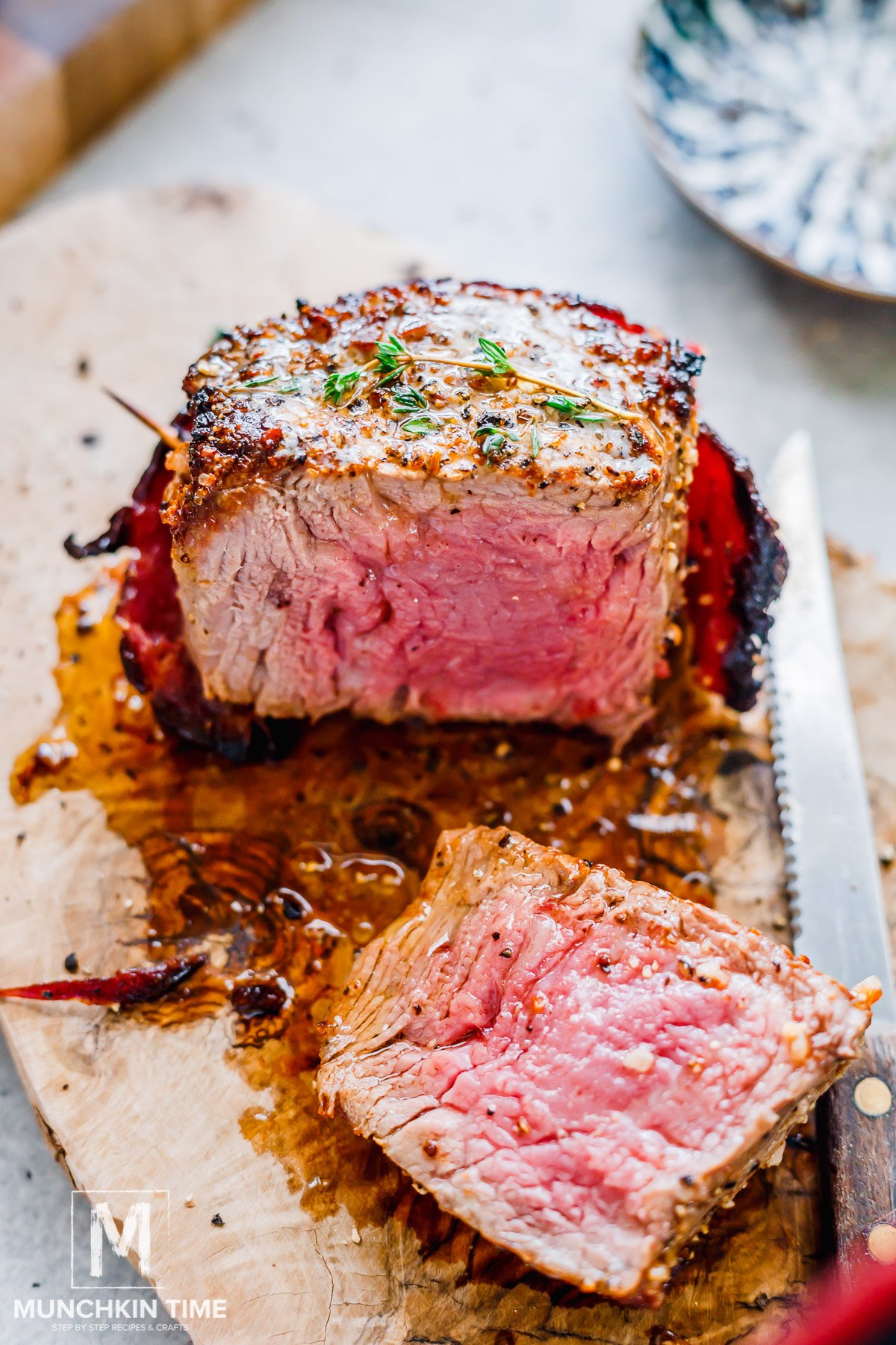 Sliced cooked medium doneness filet mignon.