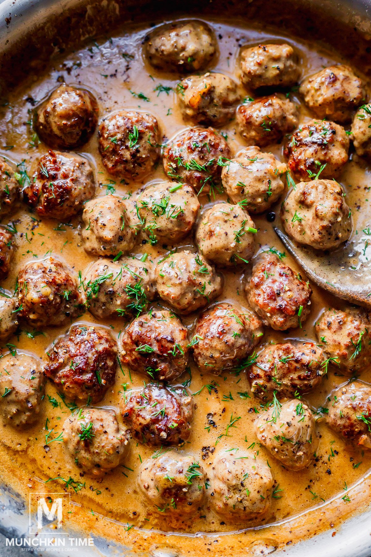 delicious cooked Swedish meatballs done cooking in the skillet.