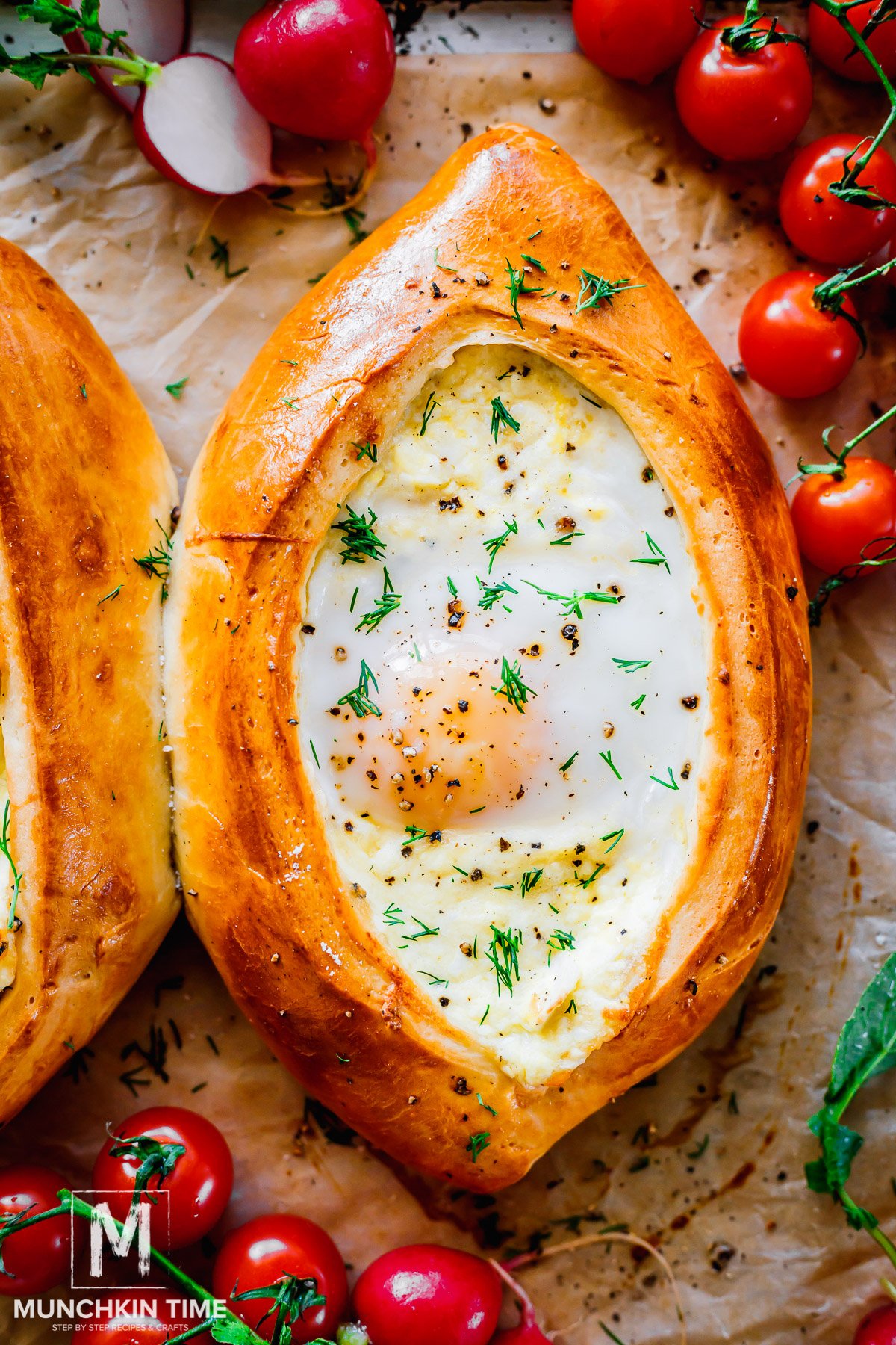 Baked Khachapuri Georgian Cheese Bread with egg in the center.