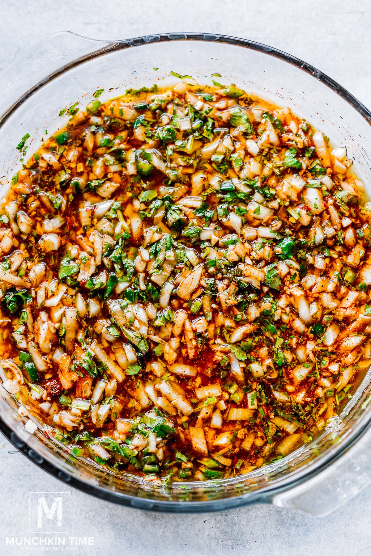 marinade ingredients mixed in a glass bowl.