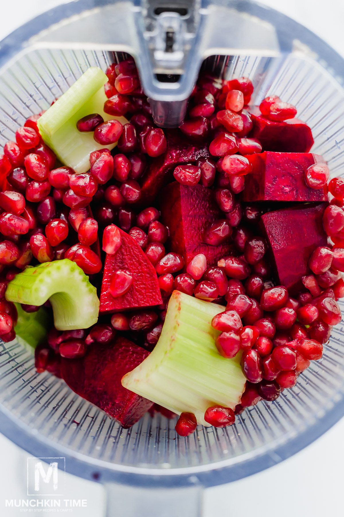 juice ingredients added to the cold-pressed juicer. 