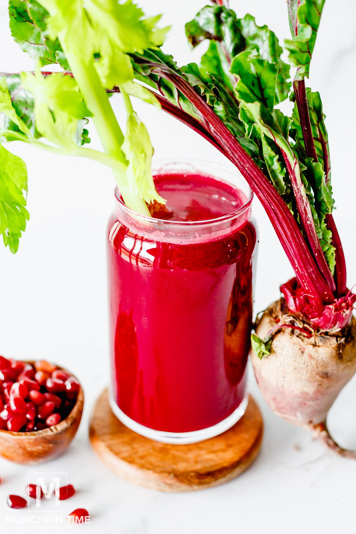 Pomegranate Beet Juice in a tall glass.